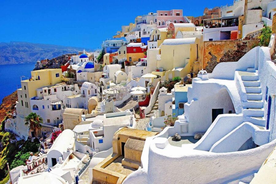 From Rethymno: Full-Day Trip to Santorini by Boat - Oia: Blue-and-White Views, Photo Stops, and the Crowd Reality