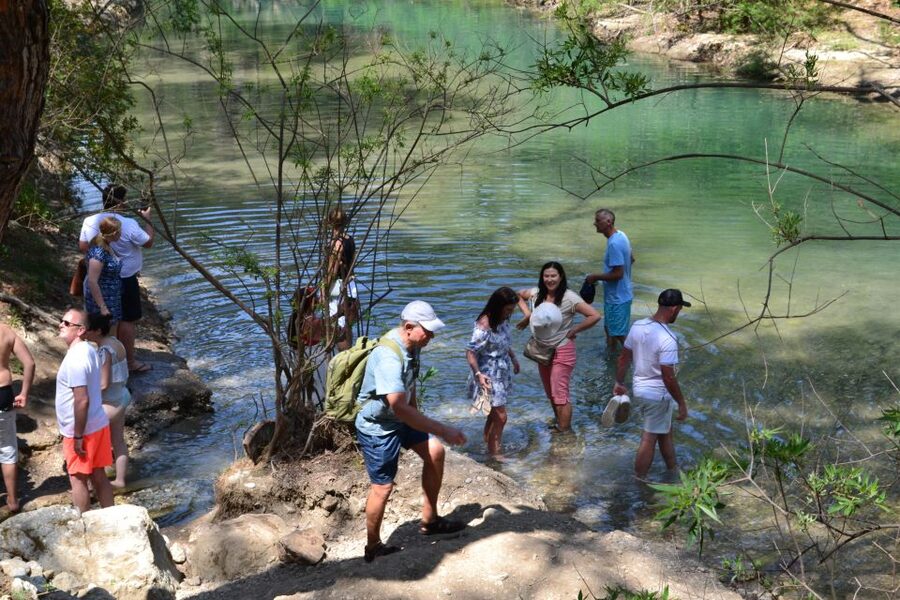 From Rhodes: Lindos and 7 Springs Valley Bus Tour - Seven Springs Valley: forest walk, tunnel, and the water reality check