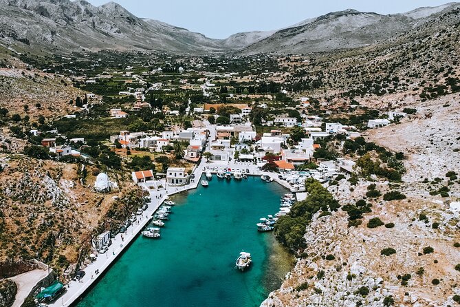 Full Day Boat Cruise to 3 Islands with optional pickup - Vathi on Kalymnos: fjord views, caves, orange juice breaks, and photos