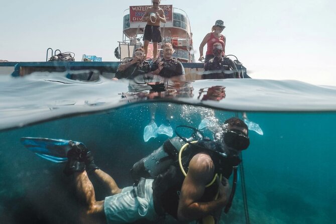 (Full day)Scuba Diving in Rhodes - Between underwater turns: snorkeling, swimming, and enjoying the boat day