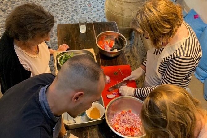 Greek Cuisine Cooking Class in Santorini with Recipes and Wine - Chef Christos and the hands-on rotation reality