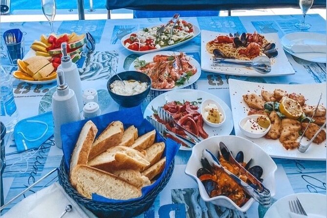 Half-Day Exclusive Catamaran Cruise in Santorini with Meal and Open Bar - Crew Energy, Service, and the Small-Group Advantage