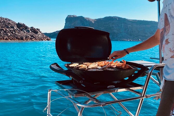 Half-Day Exclusive Catamaran Cruise in Santorini with Meal and Open Bar - Santorini Volcano and Hot Springs: The Most Memorable Swim Slot