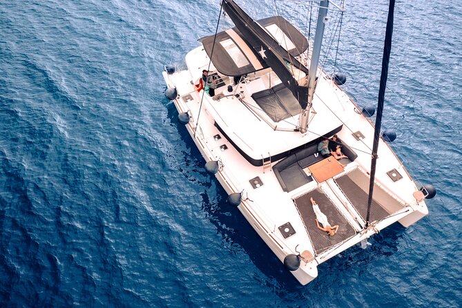 Half Day Premium Catamaran Cruise in Santorini including Oia - A premium catamaran day on Santorini, without the full-day grind