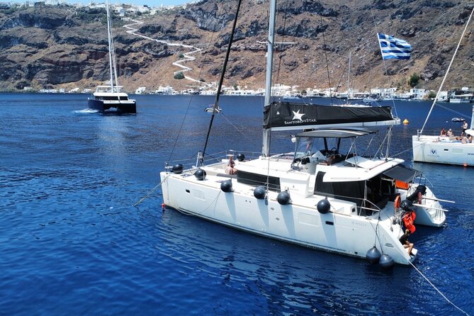 Half Day Premium Catamaran Cruise in Santorini including Oia - Pickup, timing, and why your afternoon might run long