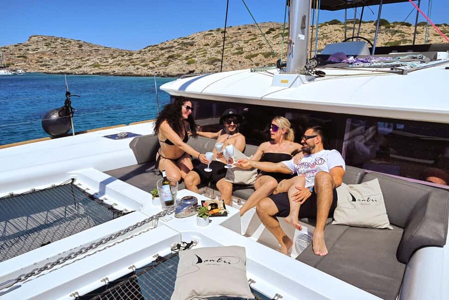 Heraklion:Dia Island Catamaran Cruise with Lunch, Water Toys - The catamaran ride out: comfort, espresso, and shaded lounging