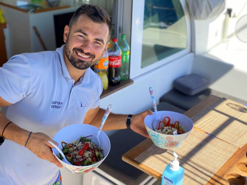 Heraklion:Dia Island Catamaran Cruise with Lunch, Water Toys - Meeting point, transfers, and what to bring for smooth sailing
