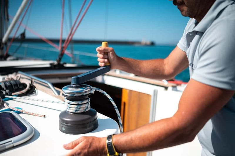 Heraklion: Sailing Trip to Dia Island with Lunch & Swimming - The crew is the show: Captain George, Panos, and Vaso