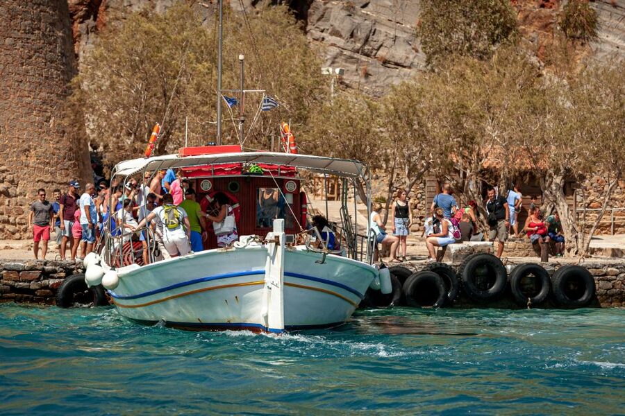 Heraklion: Spinalonga, Agios Nikolaos, Elounda & Plaka Tour - Kolokytha Bay swim plus onboard BBQ, and how Sunday changes the meal