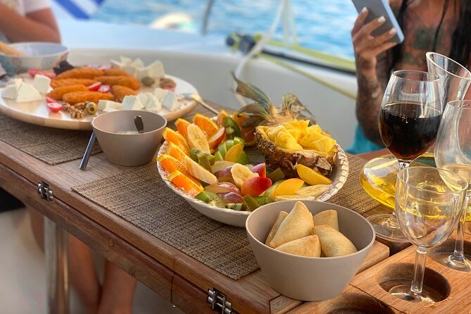 Hersonissos: Luxury Sunset Catamaran Cruise Sushi & Open Bar - Agios Georgios Sarantarís Bay, the swim, the snacks, and the sunset