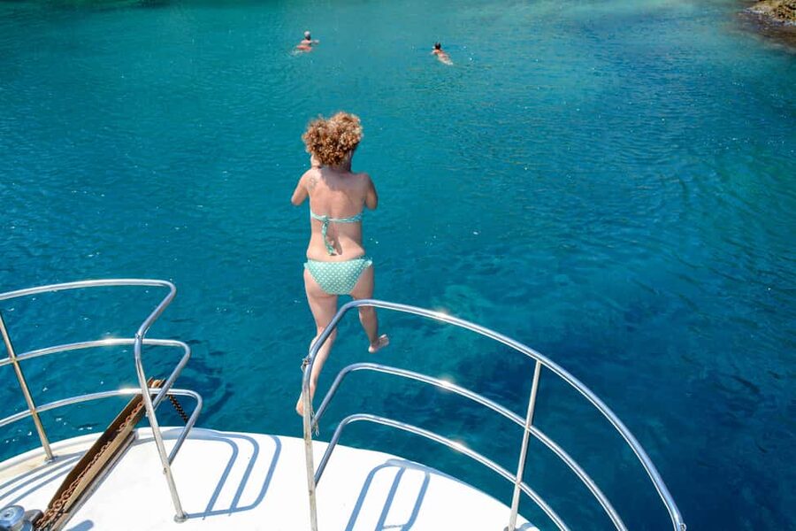 Hydra: Island Tour by Boat with Lunch - Limnioniza: the white-pebble swimming and music-on-deck break