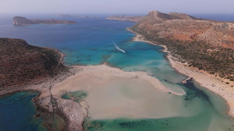 Kissamos: Balos Lagoon Sunset Cruise with Swimming & Snacks - Sunset on the return sail: the part you came for