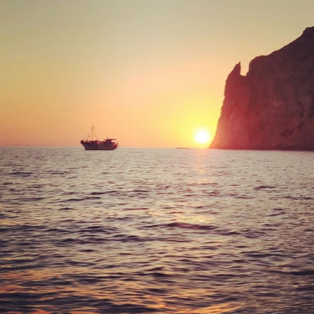 Kos: Sunset Cruise with Swimming and BBQ Dinner - Sunset from Kefalos Bay: the best photos happen on the return sail