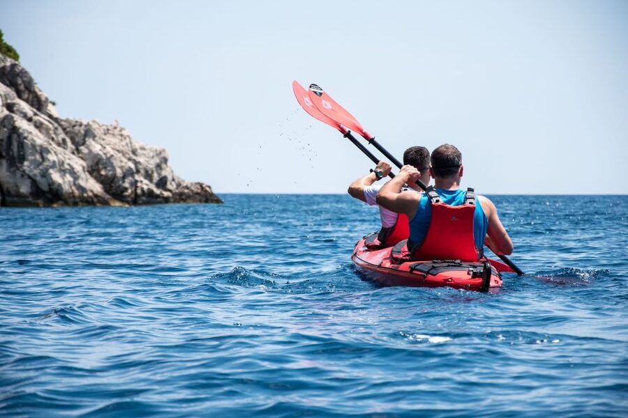 Lefkada: Full Day Sea Kayaking Tour - The first swim after a coastal paddle: Red Rock Beach