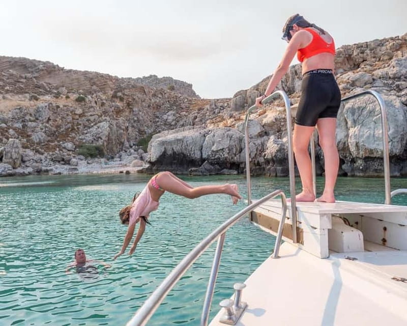 Lindos: 1.5 Hour Glass-Bottom Boat Cruise with Swim Stops - Onboard crew, humor, and why the guide name matters