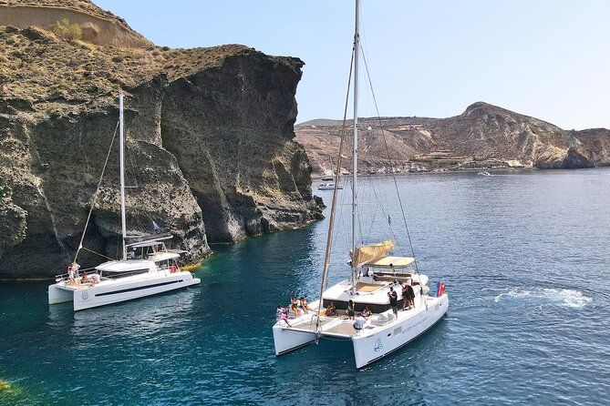 Luxury Santorini Sunset Cruise: Dinner, BBQ, Open Bar, Transfers - Volcano hot springs: the sulfur-rich caldera experience