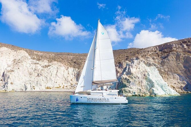 Luxury Small-Group Catamaran Cruise with BBQ, Open bar & Transfer - Sea-level caldera views from Ammoudi and past Thirasia