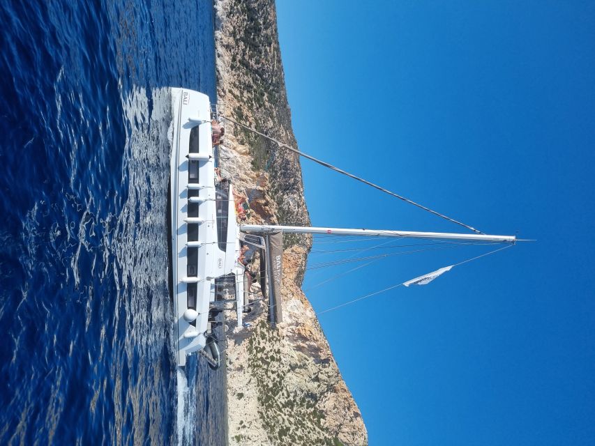 Milos: Full-Day Catamaran Cruise with Food and Open Bar - Akra Vani to Kalógries: From Sea Views to a Breakfast Swim
