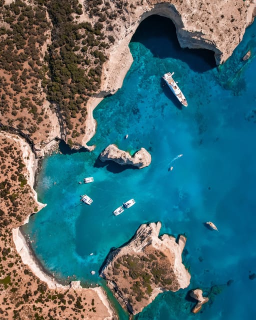 Milos: Full-Day Kleftiko Poliegos Sailboat Tour with Lunch - Poliegos dessert, Glaronisia photo break, and the island-hopping feeling
