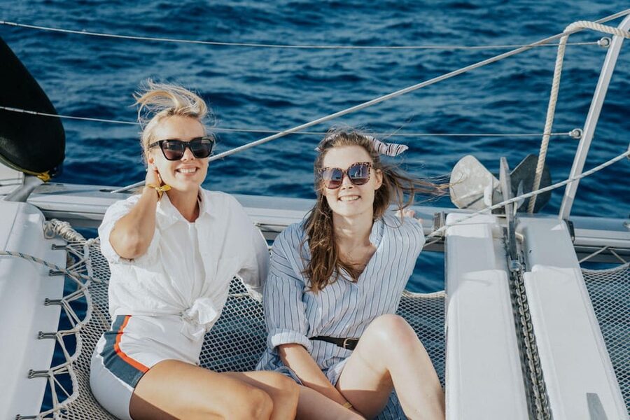 Milos: Kleftiko Morning Catamaran Cruise with Lunch & Drinks - Cape Vani and Sykia Cave: dramatic cliffs, short stops, big payoffs