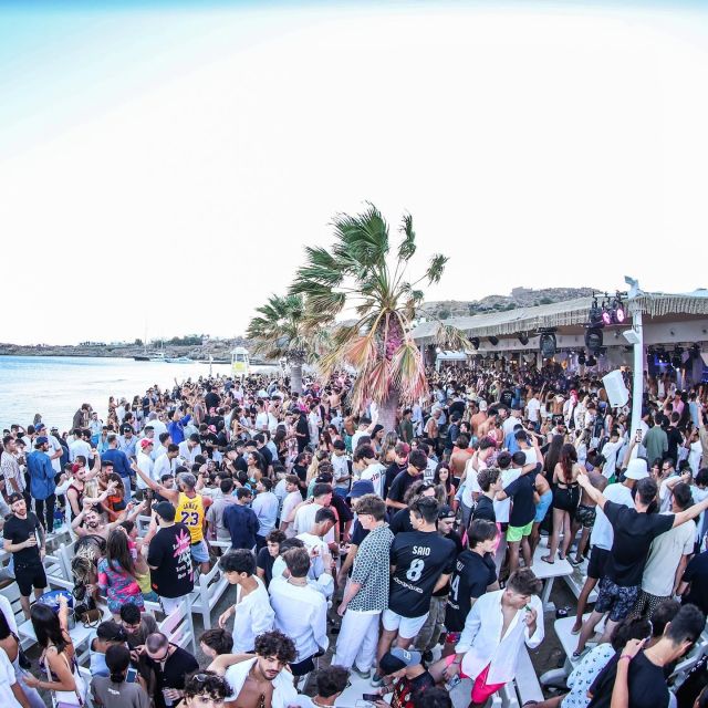 Mykonos: Best Beach Clubs Crawl Day Party - Hotel pickup to Paradise Beach, the ride that sets the tone