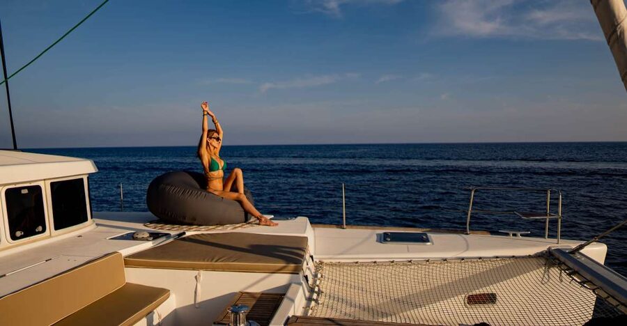 Mykonos: Boho Experience Catamaran Cruise - The Day Experience: Delos Morning Sights and a Rhenia Swim