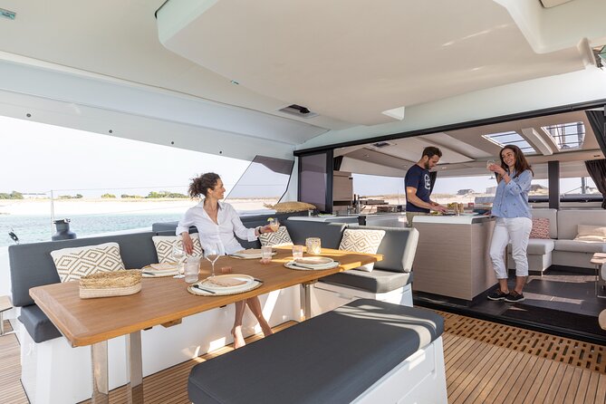 Mykonos: Brand-New Catamaran Cruise with Meal, Drinks & Transport - Lunch onboard and the real value of drinks