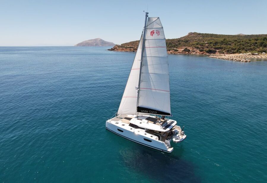 Mykonos: Catamaran Cruise with 3-Course Meal and Transfers - Pickup, Safety Briefing, and Tender Boat Basics