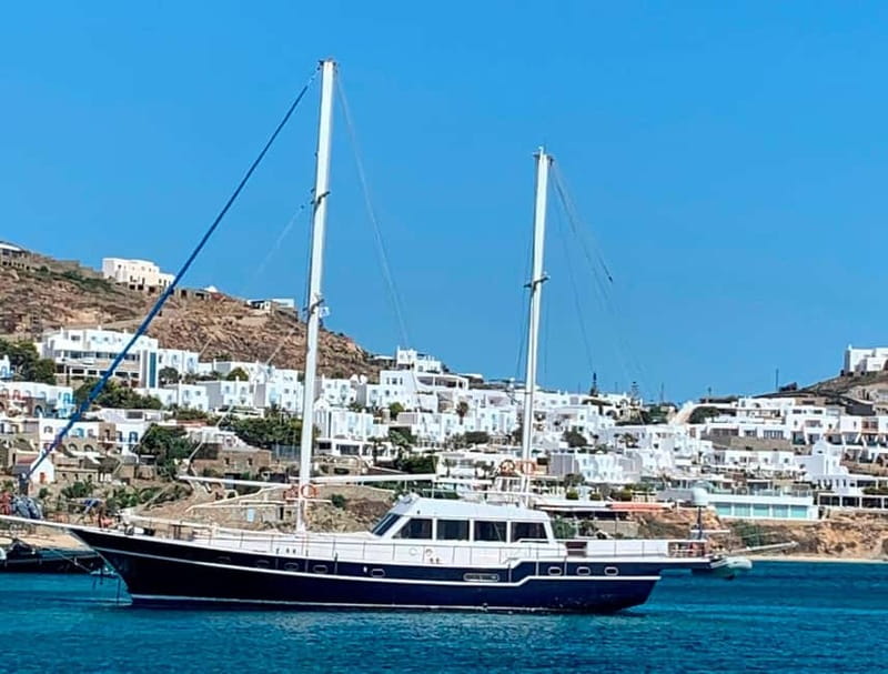 Mykonos: Delos and Rhenia Islands Cruise with BBQ Meal - The sailing stretch: views, refreshments, and the first Delos glimpse