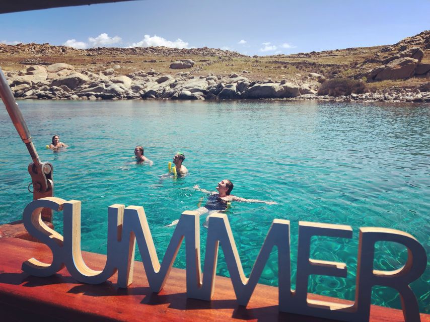 Mykonos: Delos and Rhenia Islands Cruise with BBQ Meal - Delos ruins: optional guided structure, plus self-paced time
