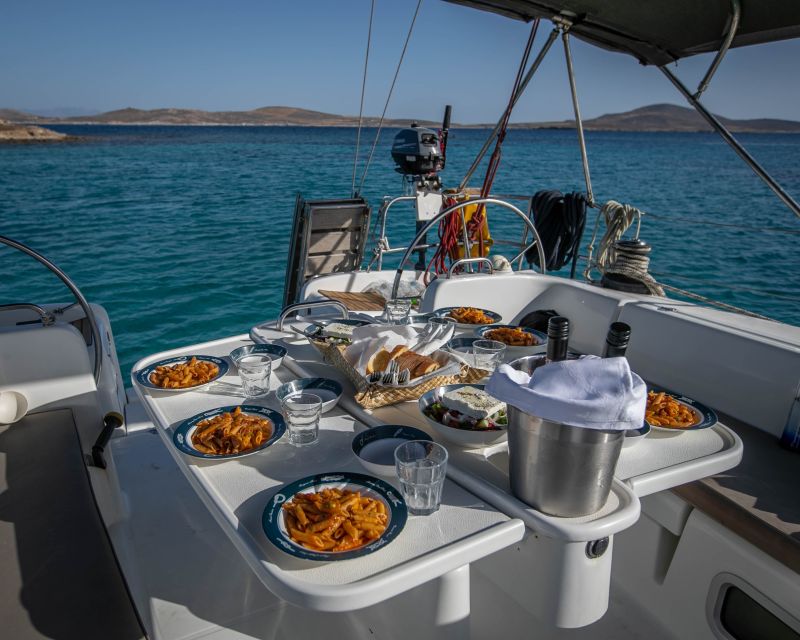 Mykonos: Delos & Rhenia Boat Cruise with Lunch & Transfer - Rhenia Uninhabited Island: Secluded Bays and Real Swimming Time