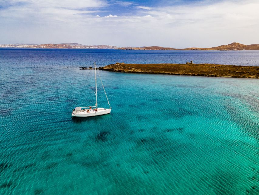 Mykonos: Delos & Rhenia Boat Cruise with Lunch & Transfer - Snorkeling, Goggles, and a Weather-Optional SUP