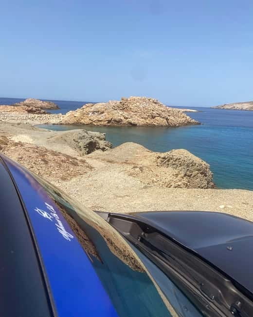 Mykonos: Private Island Tour with local guide -Jeep Renegade - Mykonos Town icons: windmills, Little Venice, and Paraportiani energy