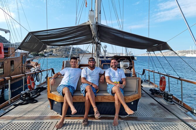 Mykonos Sail Cruise to Rhenia, Guided Tour of Delos, Lunch&Drinks - Rhenia Island swim stop, clear water, and what snorkeling really means here