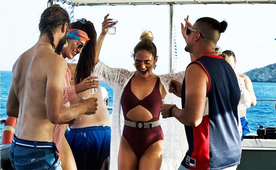 Mykonos: Sunset Boat Party with Open Bar & Live DJ - Swim stops in the Aegean: inflatables, jumping board, and practical water time