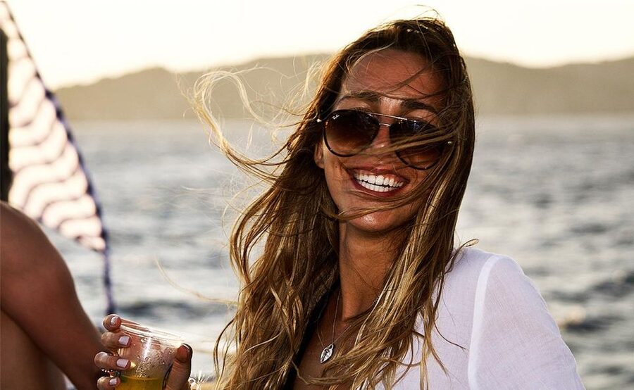 Mykonos: Sunset Boat Party with Open Bar & Live DJ - Sunset time: sweets, fresh fruit, and the view payoff