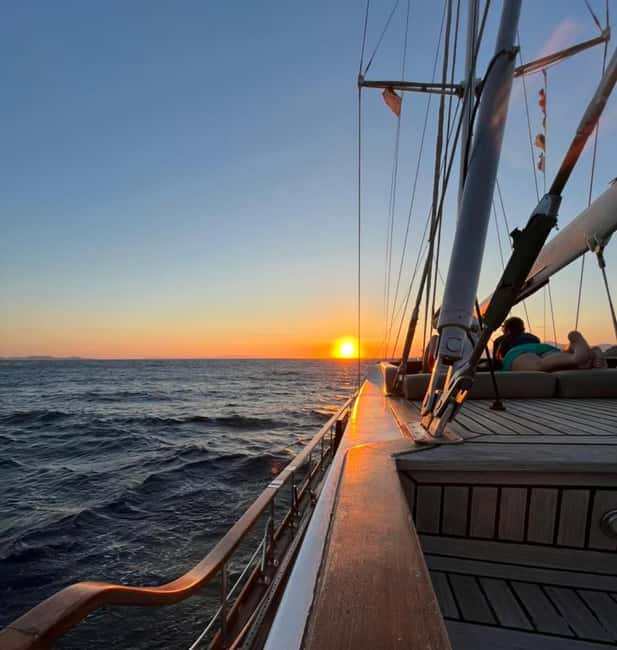 Mykonos: Sunset Sail Cruise to Rhenia, Beach Hopping, Dinner - Rhenia Island: the calm water break and the snorkel kit