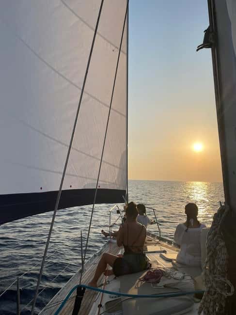 Mykonos: Sunset Sail Cruise to Rhenia, Beach Hopping, Dinner - The early Greek buffet, drinks, and the Wi-Fi perk