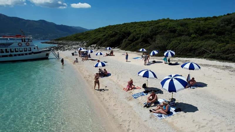 Nydri: Island Hopping Boat Cruise with Beach BBQ Lunch - Skorpios and Onassis Island stories: celebrity history without the lecture