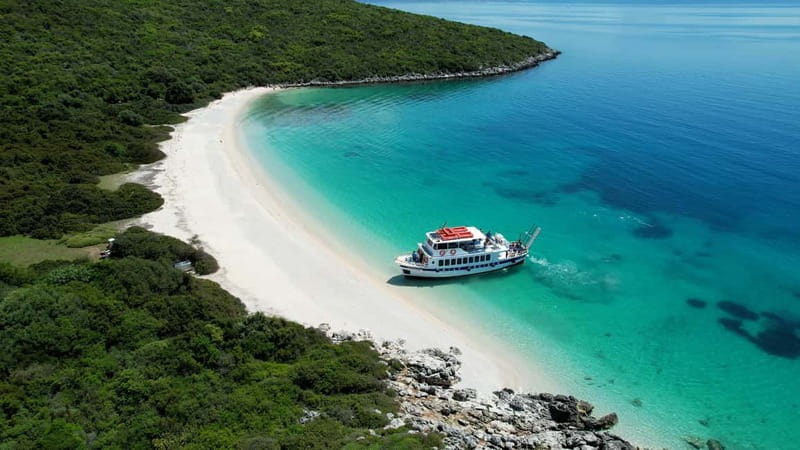 Nydri: Island Hopping Boat Cruise with Beach BBQ Lunch - Cave of Papanikolis: swimming inside Greece’s famous sea cave