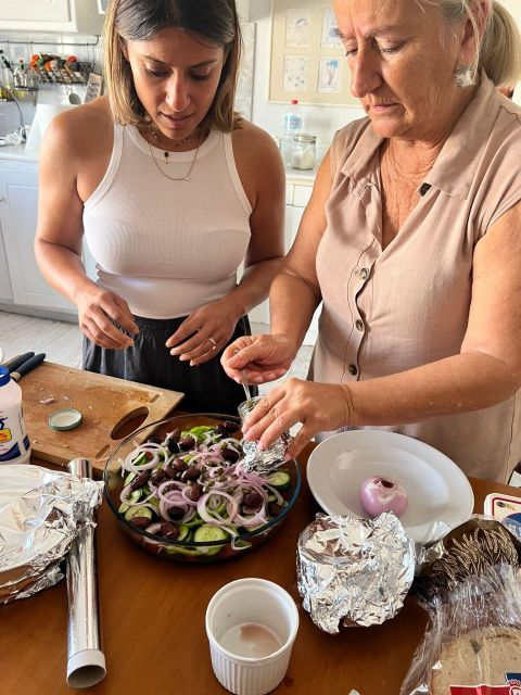 Oia: Greek Cooking Class and Lunch with a Local Grandmother - A real 3-hour lunch: how the class and 4 courses unfold