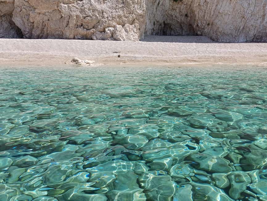 Paleokastritsa: Kasteli, Blue Caves, & Limni Beach Boat Trip - Agios Spiridonas Beach finish: a useful landing point for your Corfu afternoon
