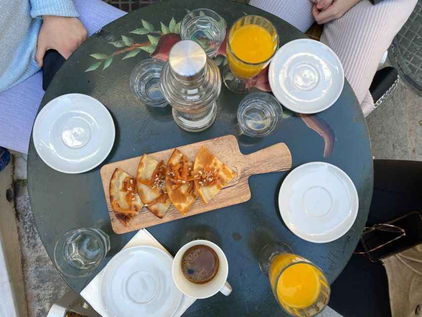 Rethymno: Old Town Walking Tour with Meal - Cretan kafeneio breakfast: cheese pie, coffee or juice, and real food talk