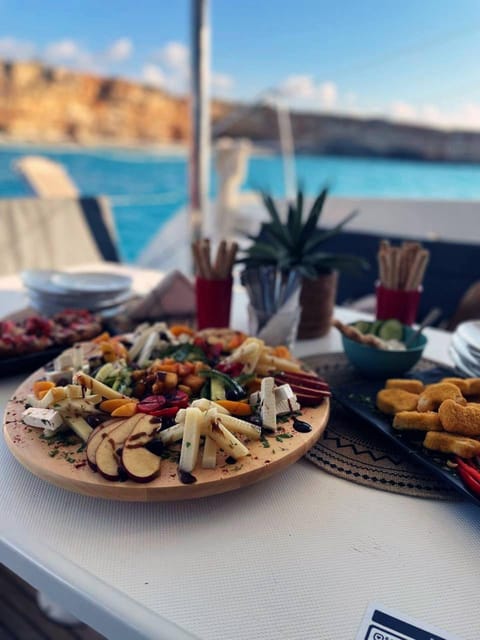 Rethymno: Sunset Catamaran Cruise - Sushi & Open Bar - Geropotamos stop: the swim, the beer and wine, and the sunset photo moment