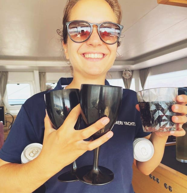 Rethymno: Sunset Catamaran Cruise - Sushi & Open Bar - Water time: SUP, snorkeling, noodles, and that pink flamingo float