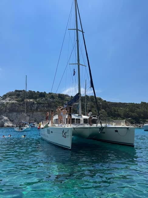 Rhodes: All inclusive Catamaran Escape with Lunch & Drinks - Ladiko Bay lunch stop: where you can slow down