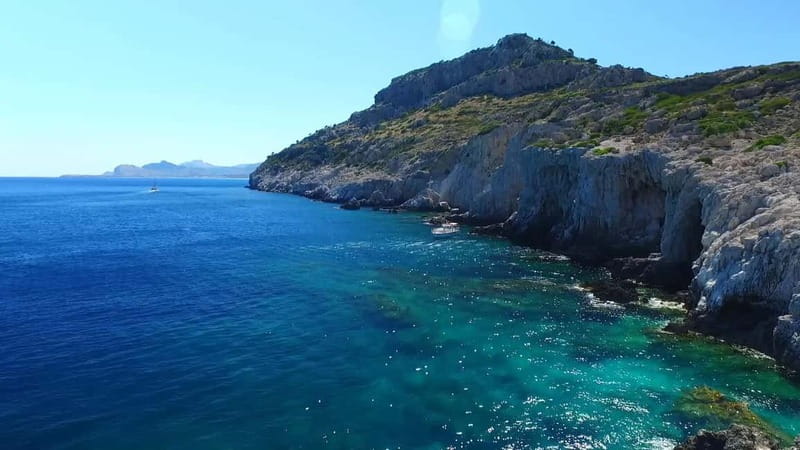 Rhodes: Anthony Quinn Bay & Sea Caves Snorkeling Cruise - Anthony Quinn Bay and the Guns of Navarone Pier photo moment