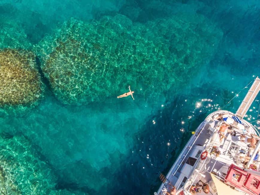 Rhodes: Boat Tour with Snorkeling, Gourmet Buffet & Open Bar - Rhodes coastline viewing, from St. Nicholas to Medieval old city vibes