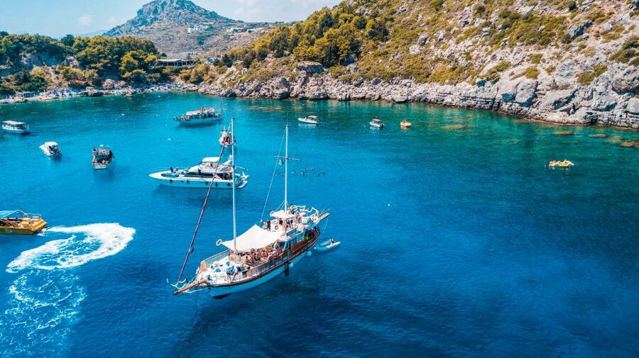 Rhodes: Cruise with 3 Stops, Lunch and Unlimited Drinks - Afandou Beach Break for Swimming, Snorkeling, and More Time in the Water