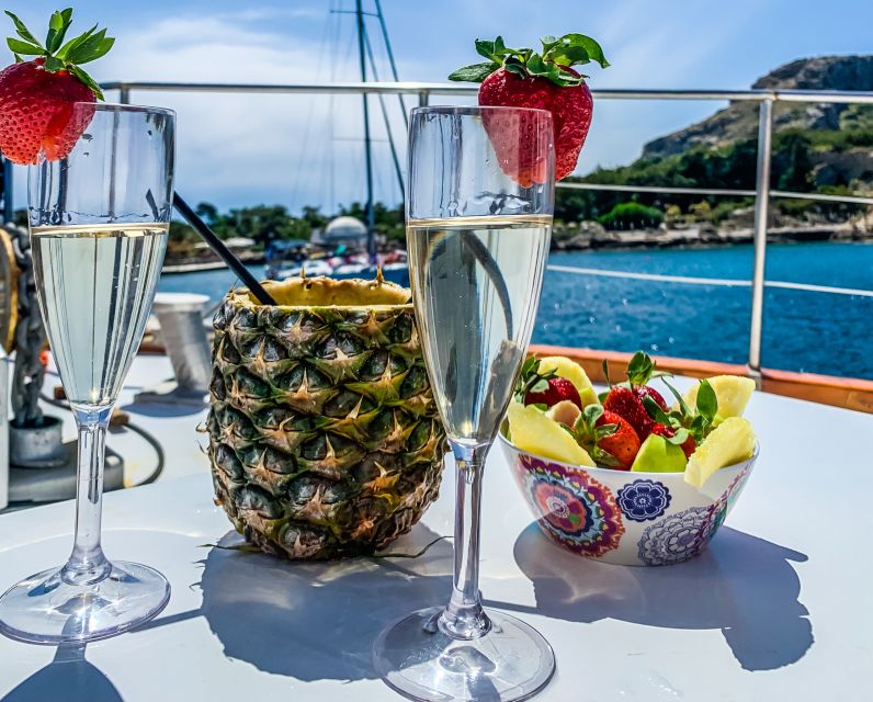 Rhodes: Cruise with 3 Stops, Lunch and Unlimited Drinks - Kallithea Springs, Rocks, Ladders, and Clear-Water Snorkeling